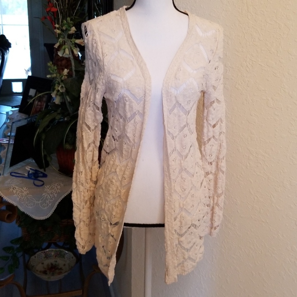 Beautiful lacy cream colored cardigan